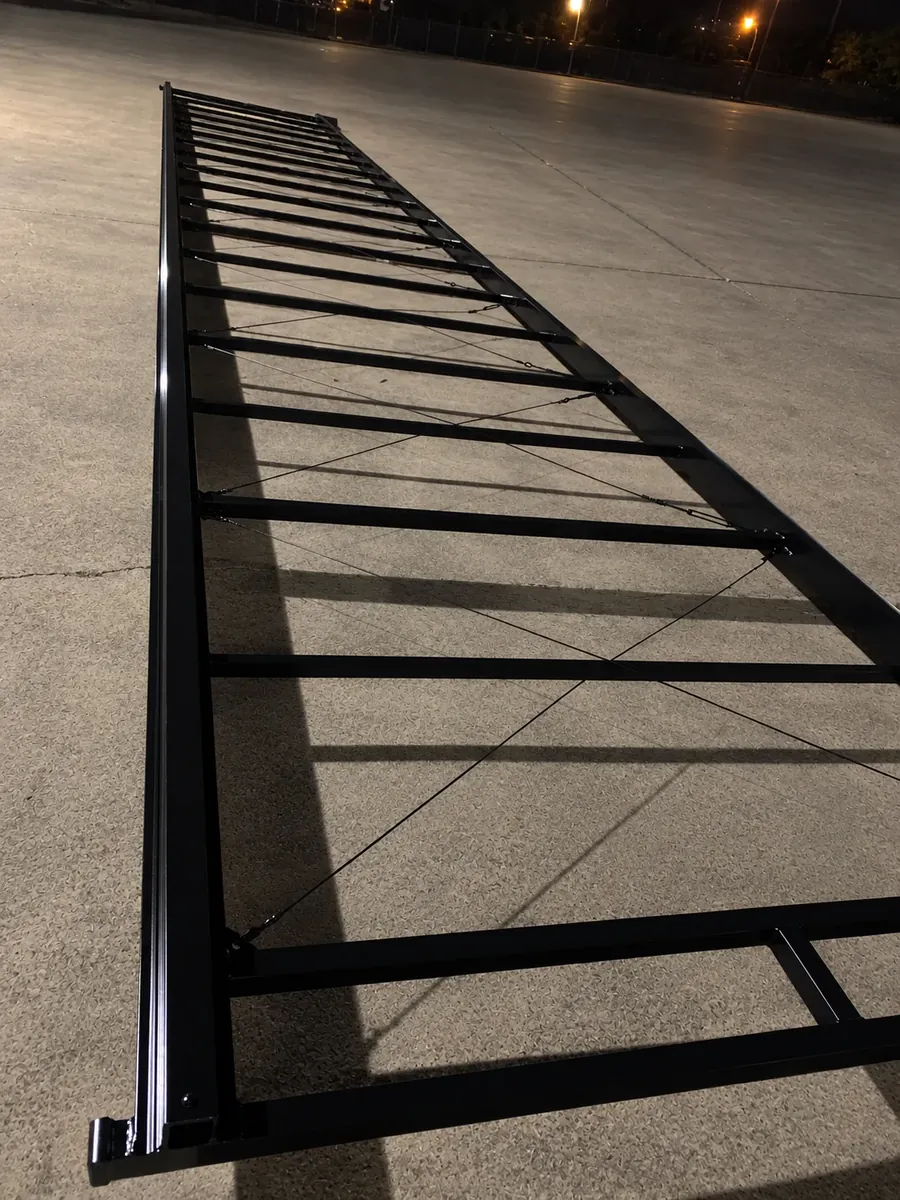 Fifty-four-foot gate finished in semi-gloss black BK05 powder coat after sweep blasting
